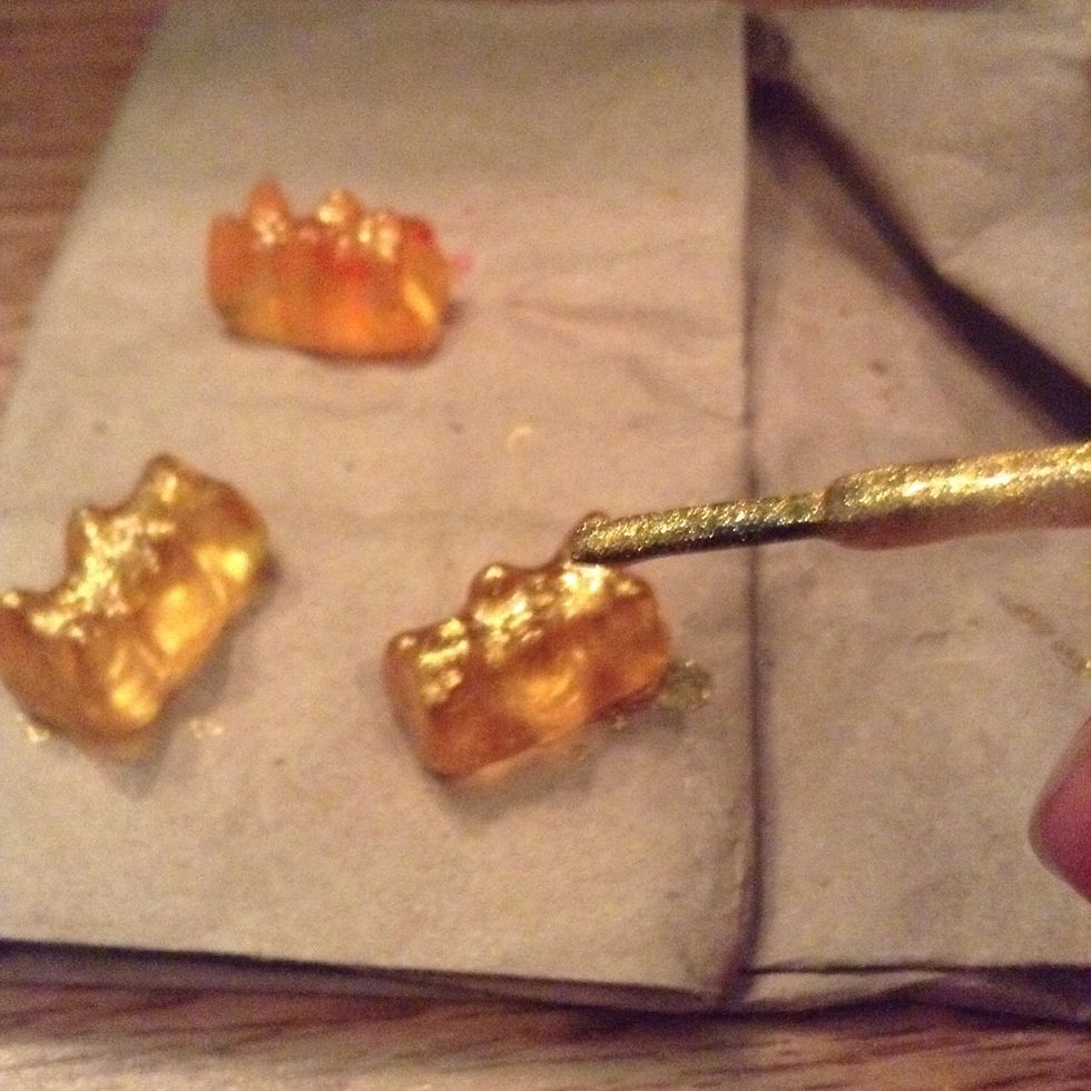 Paint at least two coats of the sparkly nail polish on your gummies (orange bears work best since they're close to the color of the nail polish...this will change depending on the color of polish)