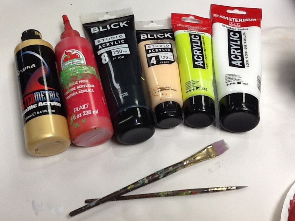Paint colors: red, peach, lime green, black and white, and gold. Two brushes: 1/2" flat head, and small round tip.