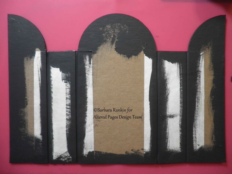 Paint edges, inside and out, and along Tyvek hinges, with black acrylic paint. Allow to dry.