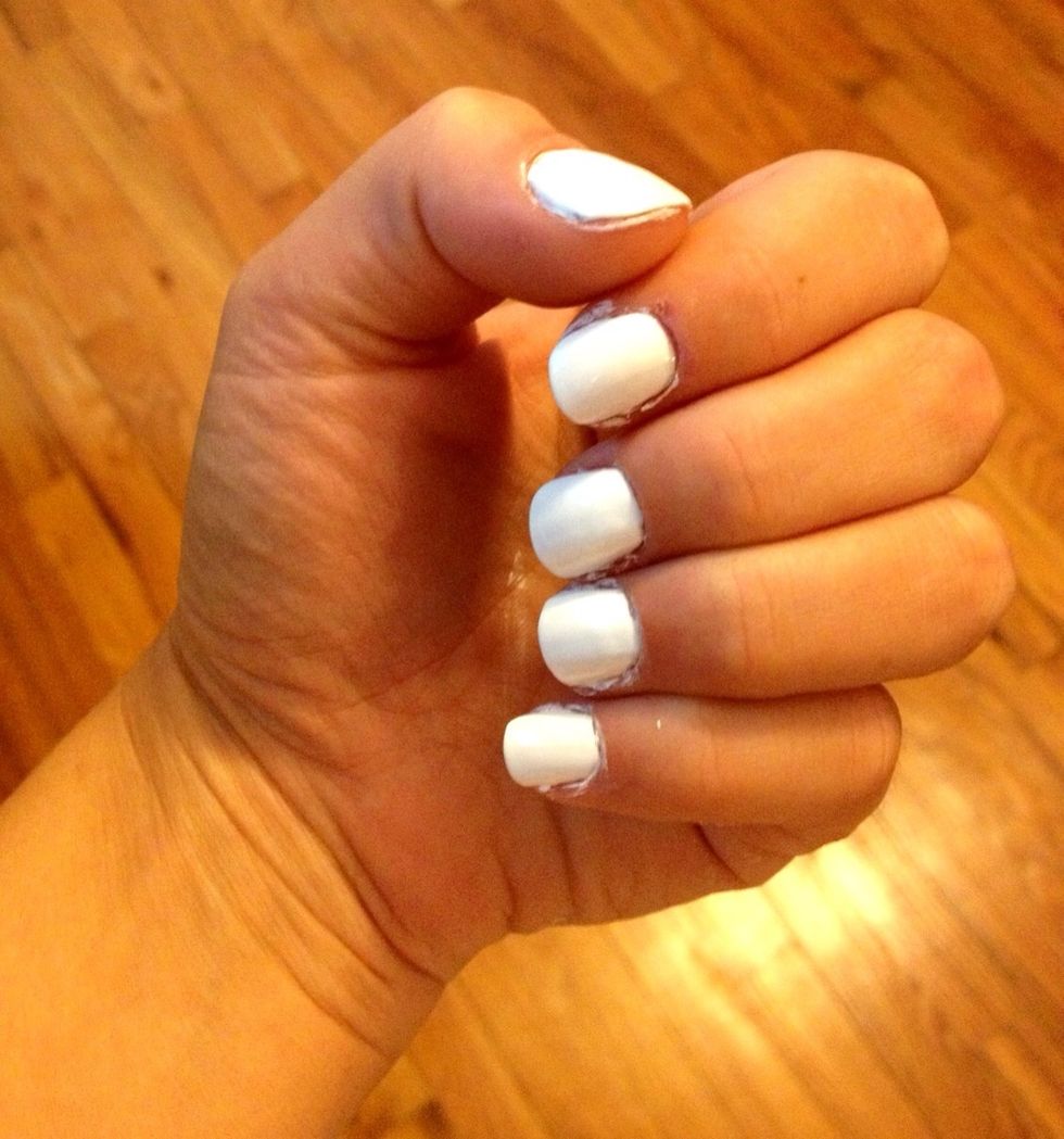 Paint entire nail white and let dry. I had to use 3 coats with the wet and wild brand