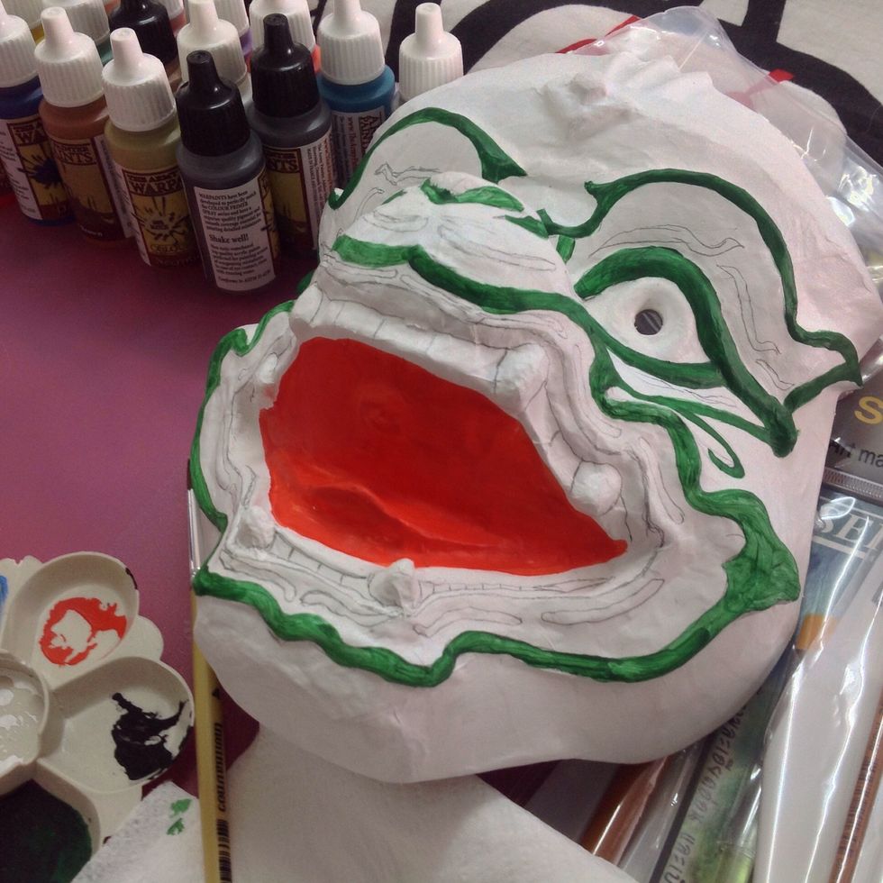 Paint green color follow the lines that you just drawn it.