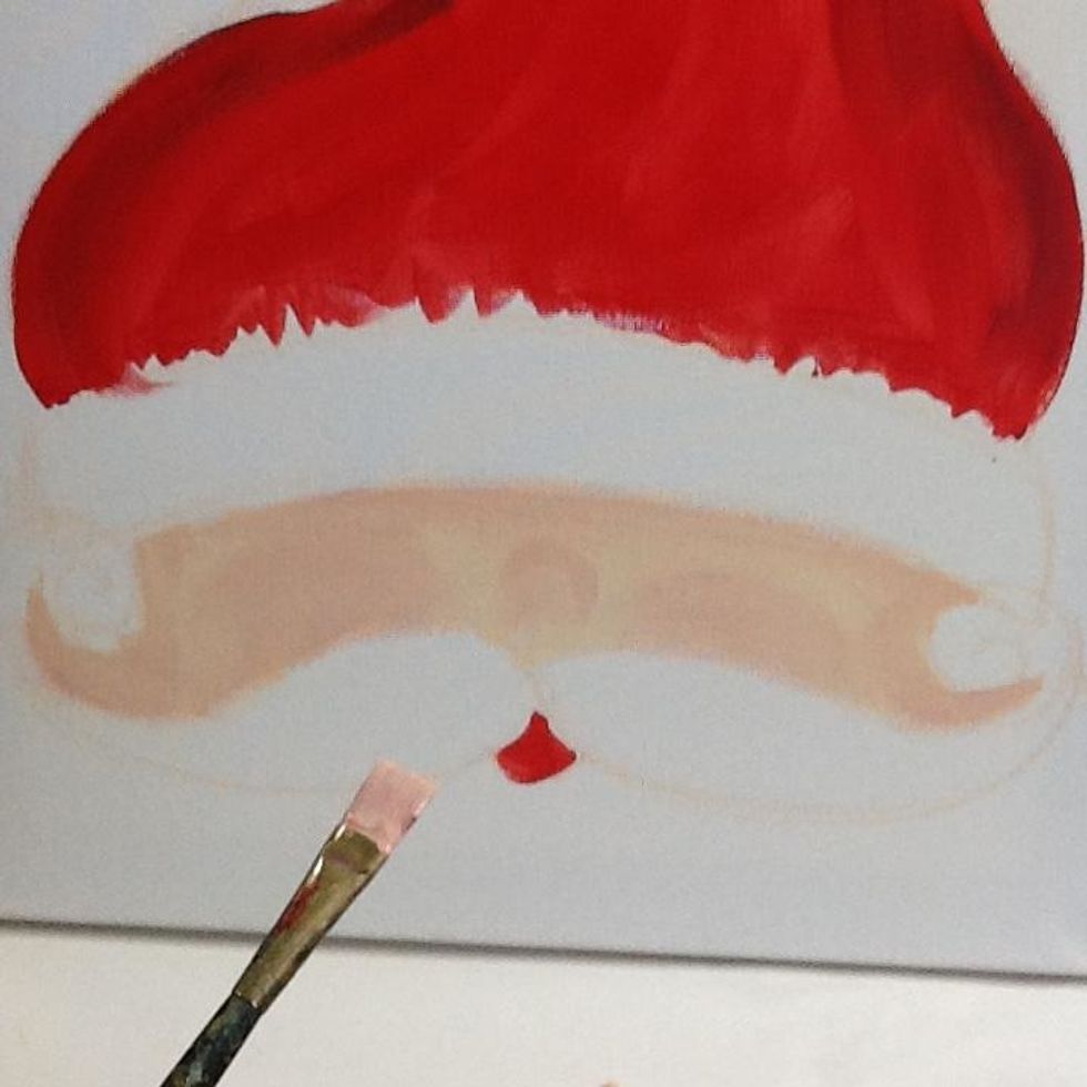 Paint his nose and cheeks with the pinkish Peachy color.