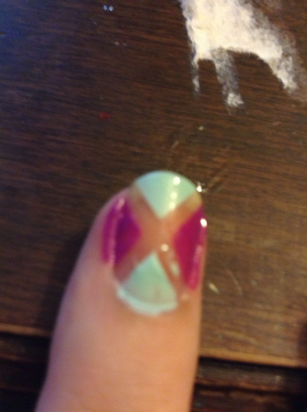 Paint it like this and immediately take off the tape. You can see I got paint in the 'x' space.