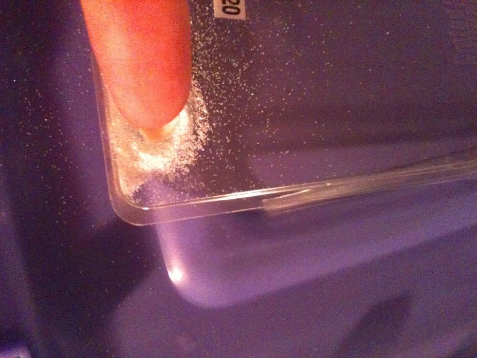 Paint just the white part of your nail with the clear coat then dip it into the glitter. Gently tap off any excess with your other finger.