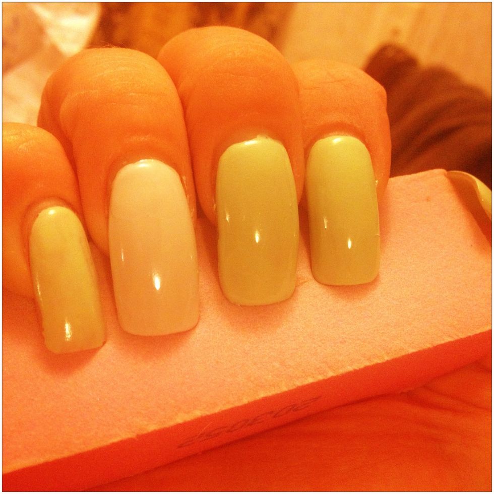 Paint nails a light green, keeping your ring finger white.