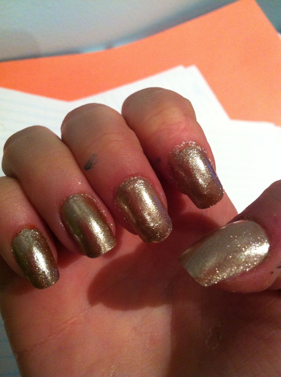 Paint nails gold until opaque