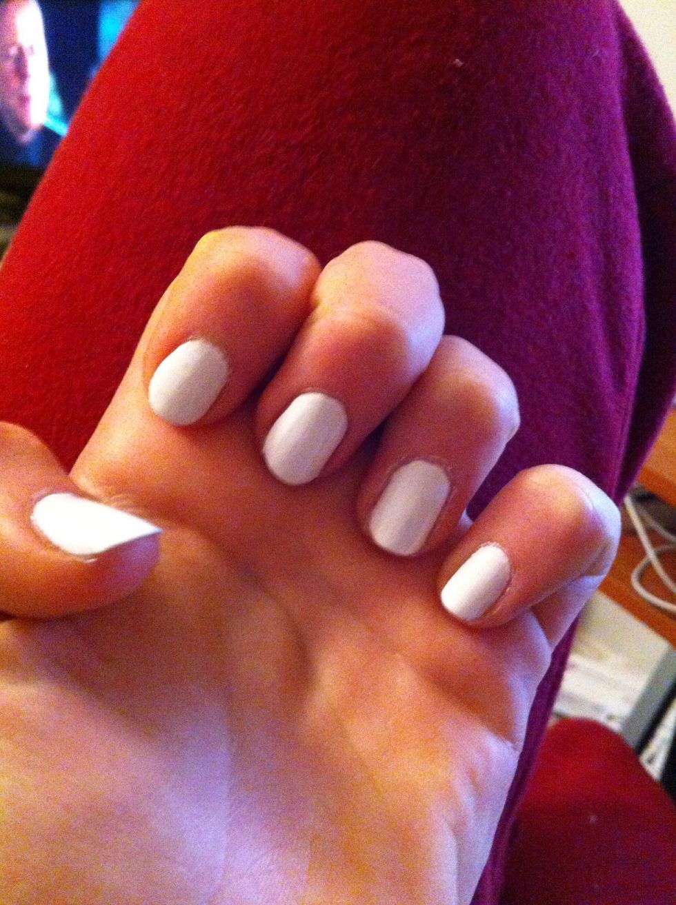 Paint nails with a basecoat and 2 coats of white