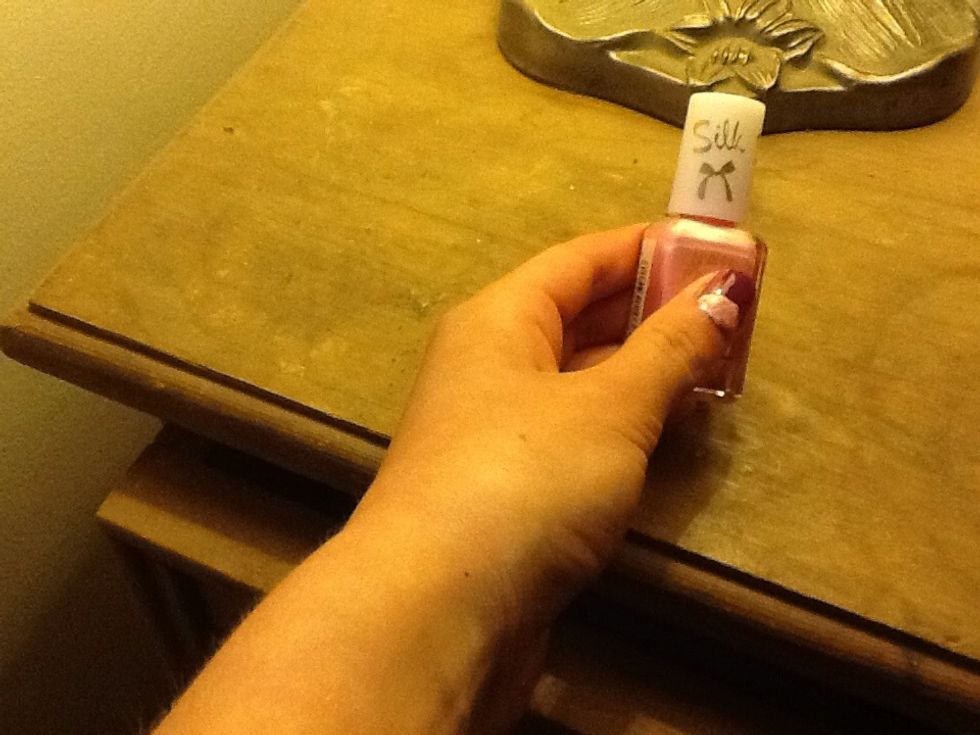 Paint on the bunny's head with a pale nail vanish, and wait for it to dry.