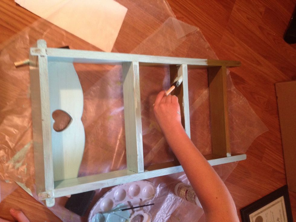 Paint on top coat. I noticed the areas with thinner paint seemed to crackle better.