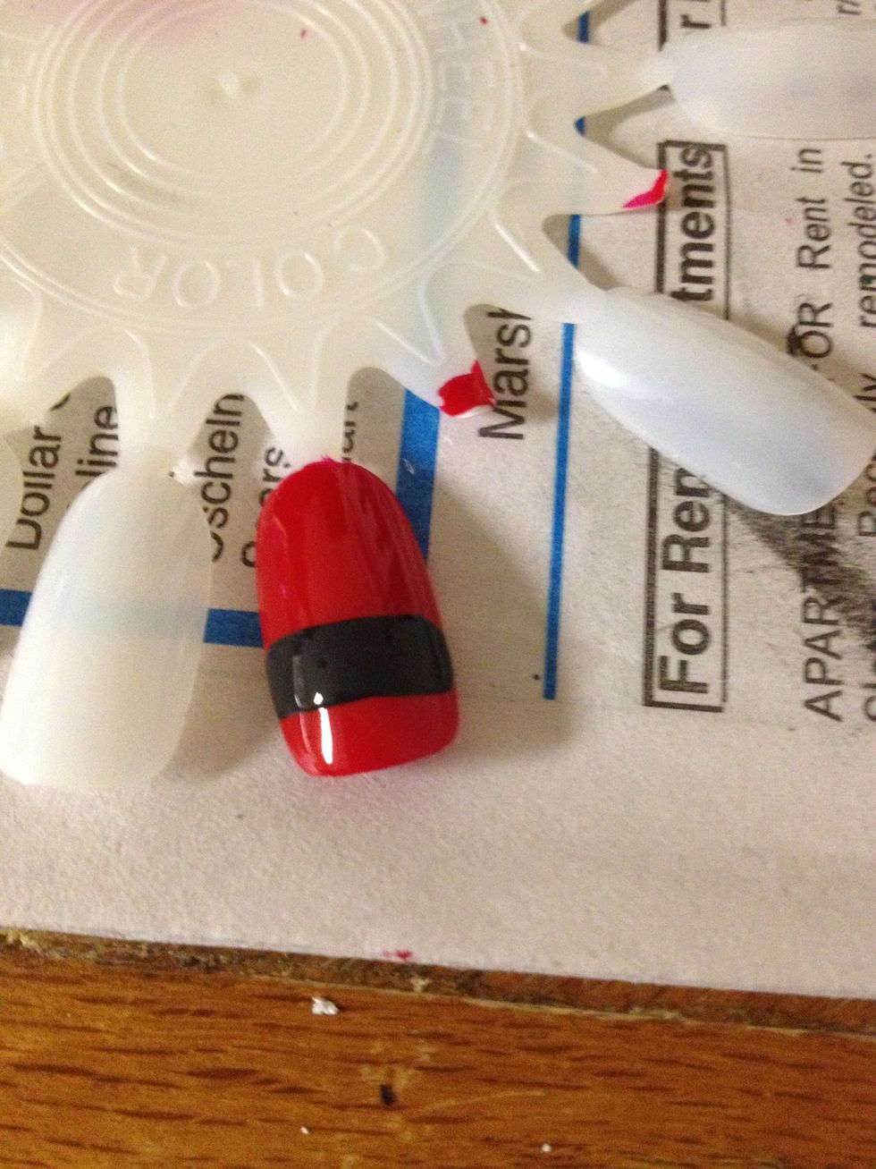 paint one stripe near the bottom of the nail