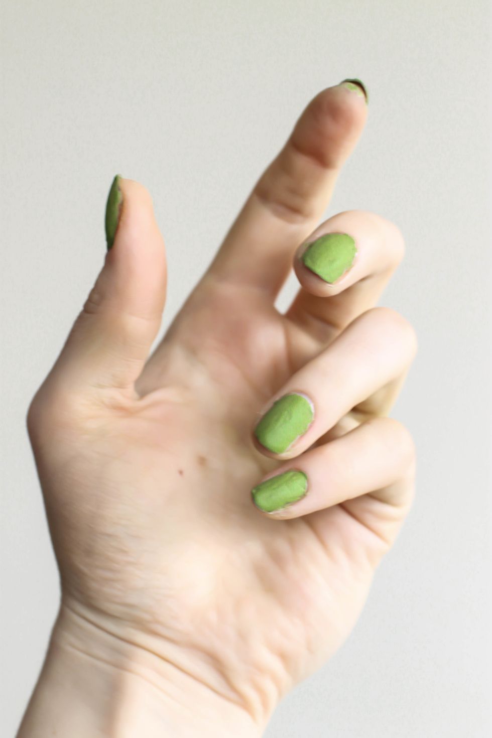 Paint onto your nails! The matcha polish looks chalky and matte and dries in a soft green.