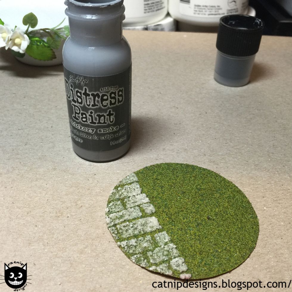 Paint over the now dry Texture Paste with a coat of Distress Paints - Hickory Smoke.