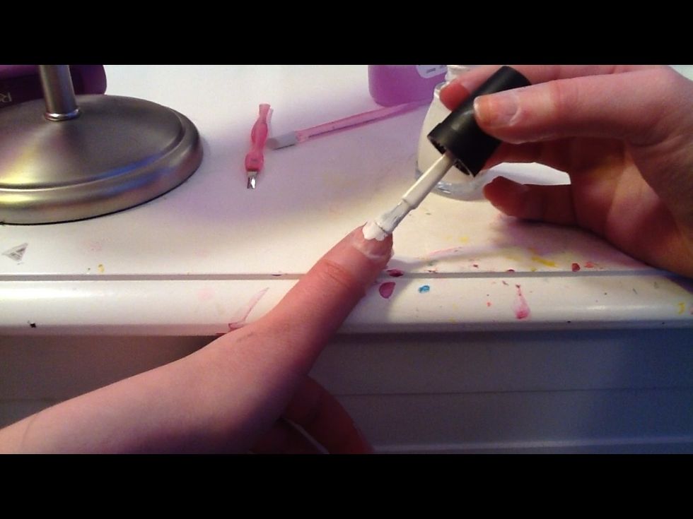 Paint over the tape, make sure you fully paint the ends where there is not any tape!