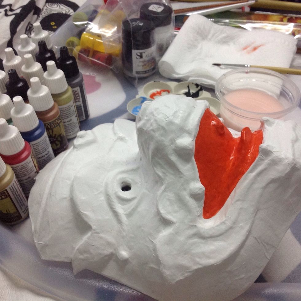 Paint red color in the mouth.