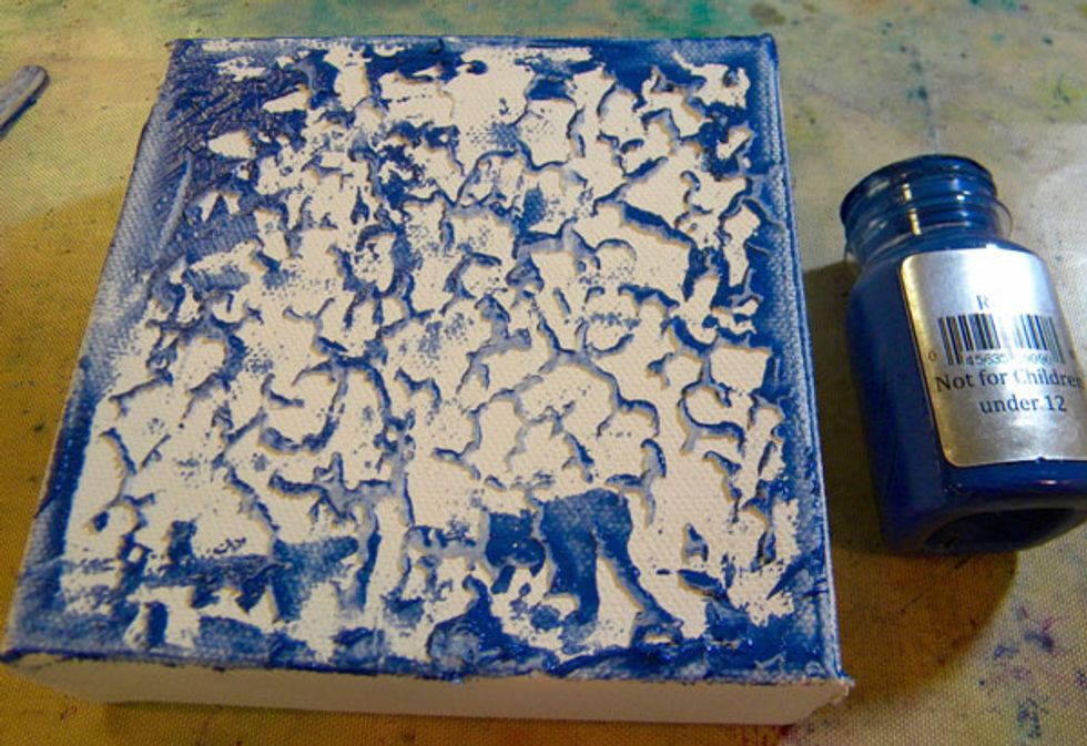 Paint Reef Velvet over the top and sides of the canvas, covering the texture completely.  I like to start with Velvets because they are more opaque.  They finish with more shimmery mediums.