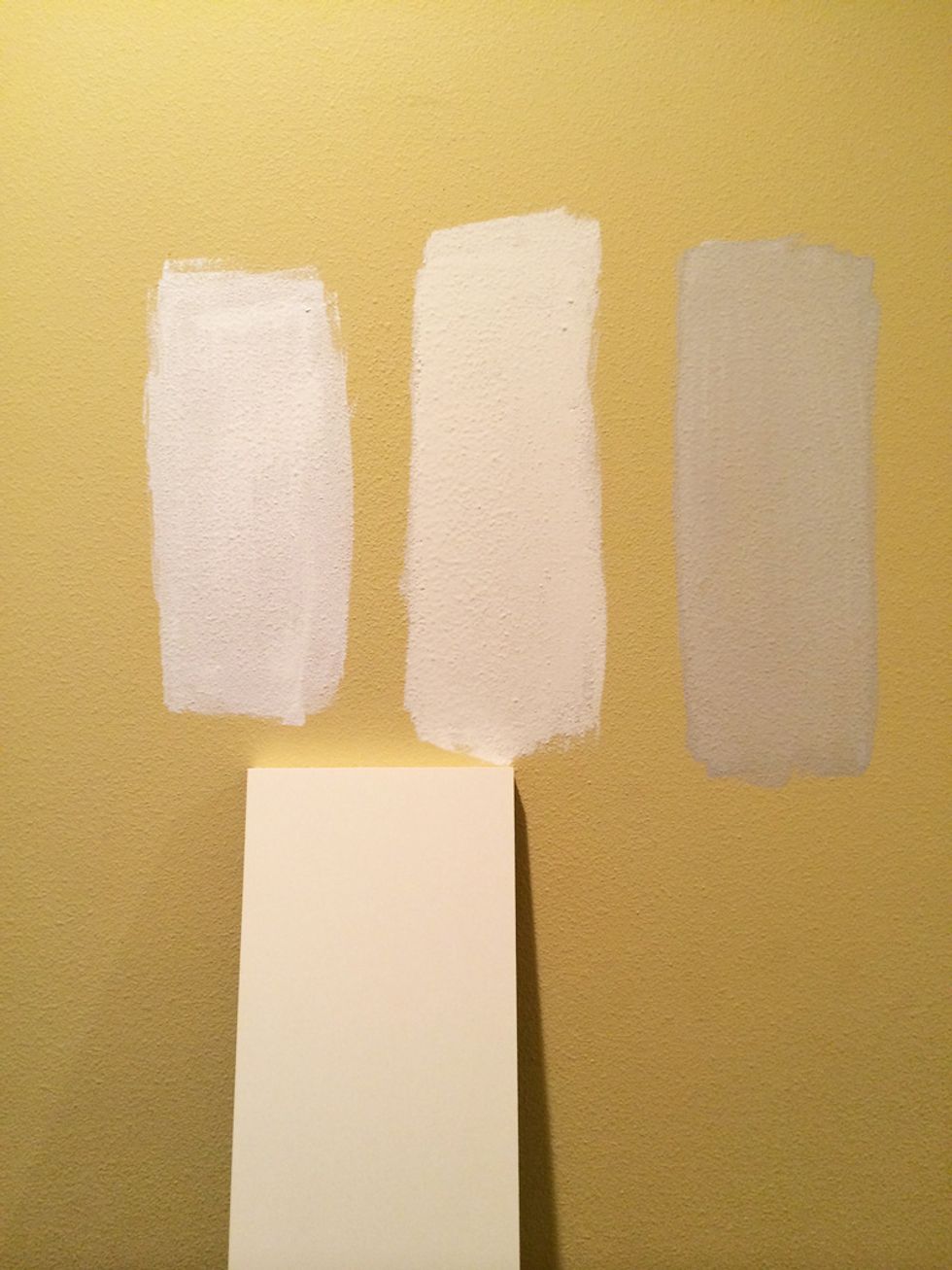 Paint several big swatches to test them out in your own space so you can see what color works best with your light and woodwork. Paint colors left to right: White on White, Swan White and Stone White.