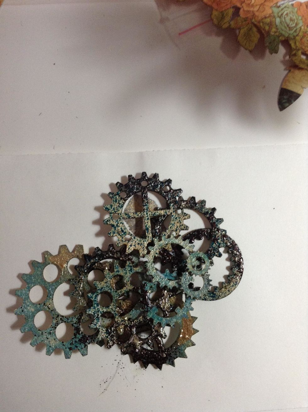 Paint some gears ...and adhere them to the ball....