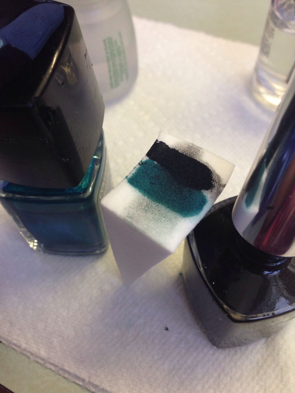 Paint some nail polish directly onto the makeup sponge. Overlap your colors just a little bit so you can get a good fading look.