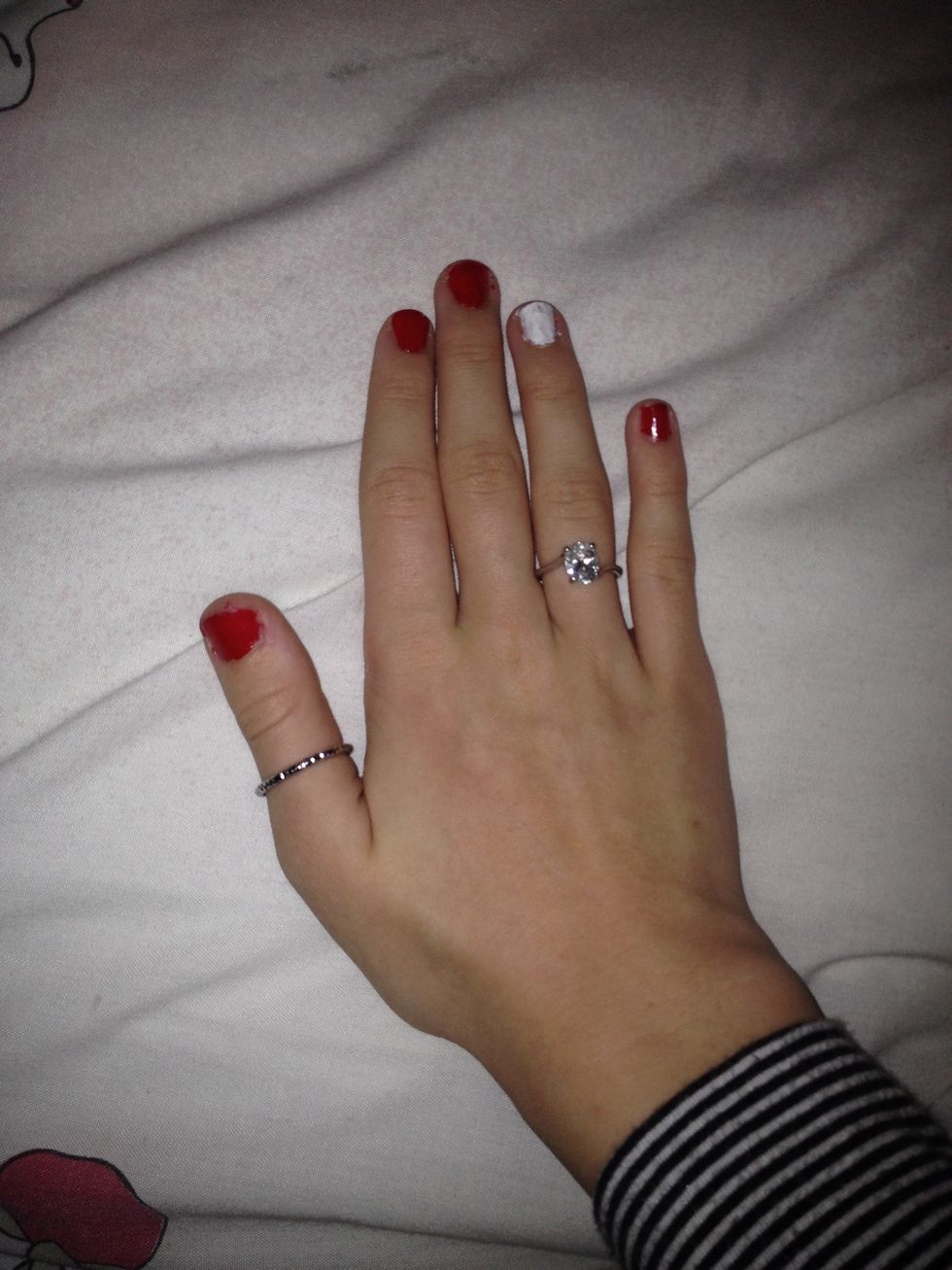 Paint the 4 nails shown red (ignore that one is white)