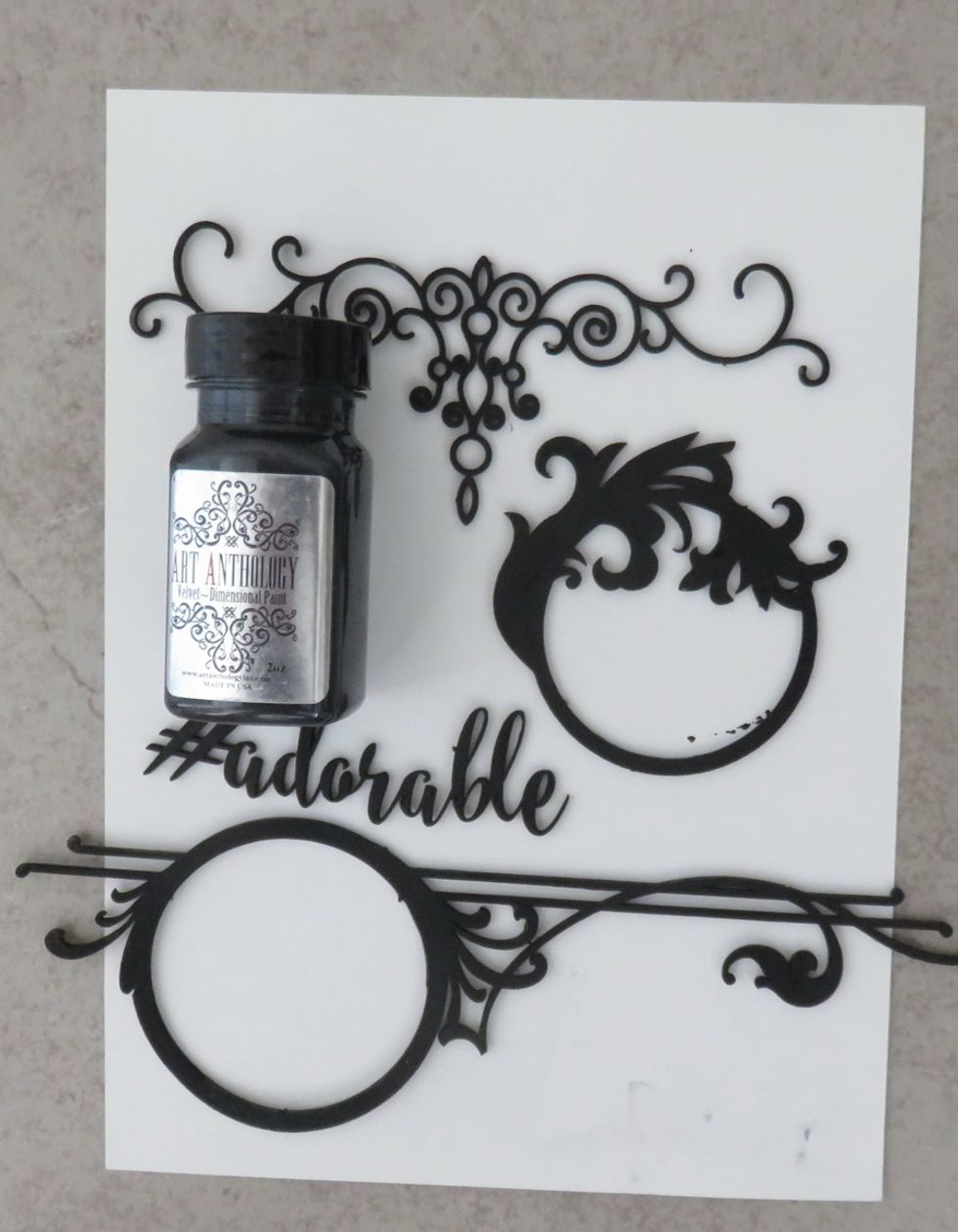 Paint the bare chipboard with a layer or two of Black Leather Jacket Sorbet paint and let them dry.