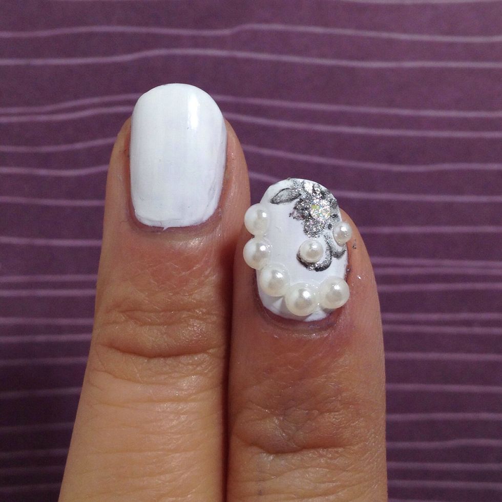 Paint the base of your nails white and allow it to dry.