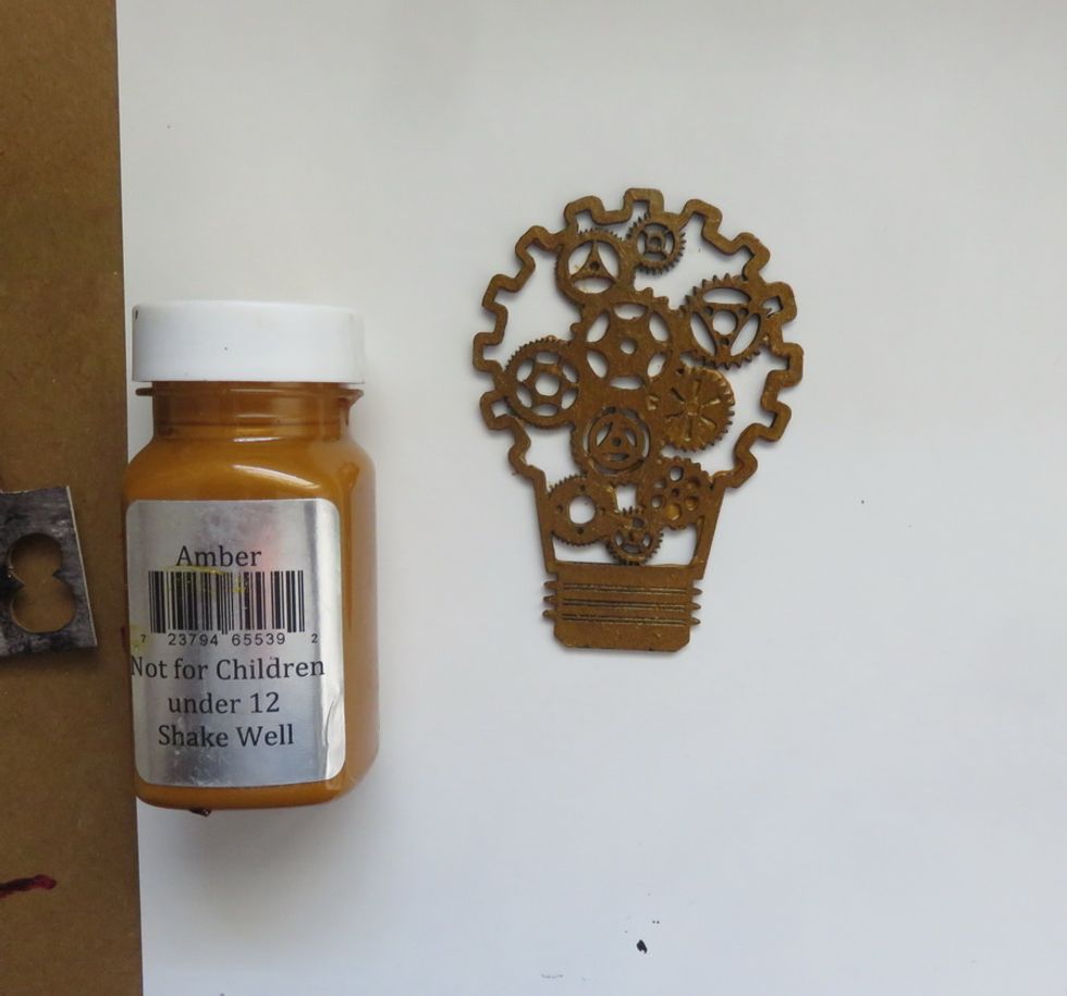 Paint the bulb shipboard with Amber paint.