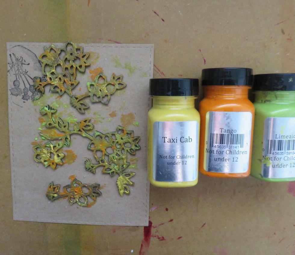 Paint the chipboard flowers with a mix of Taxi Cab, Tango and Limeaid paints