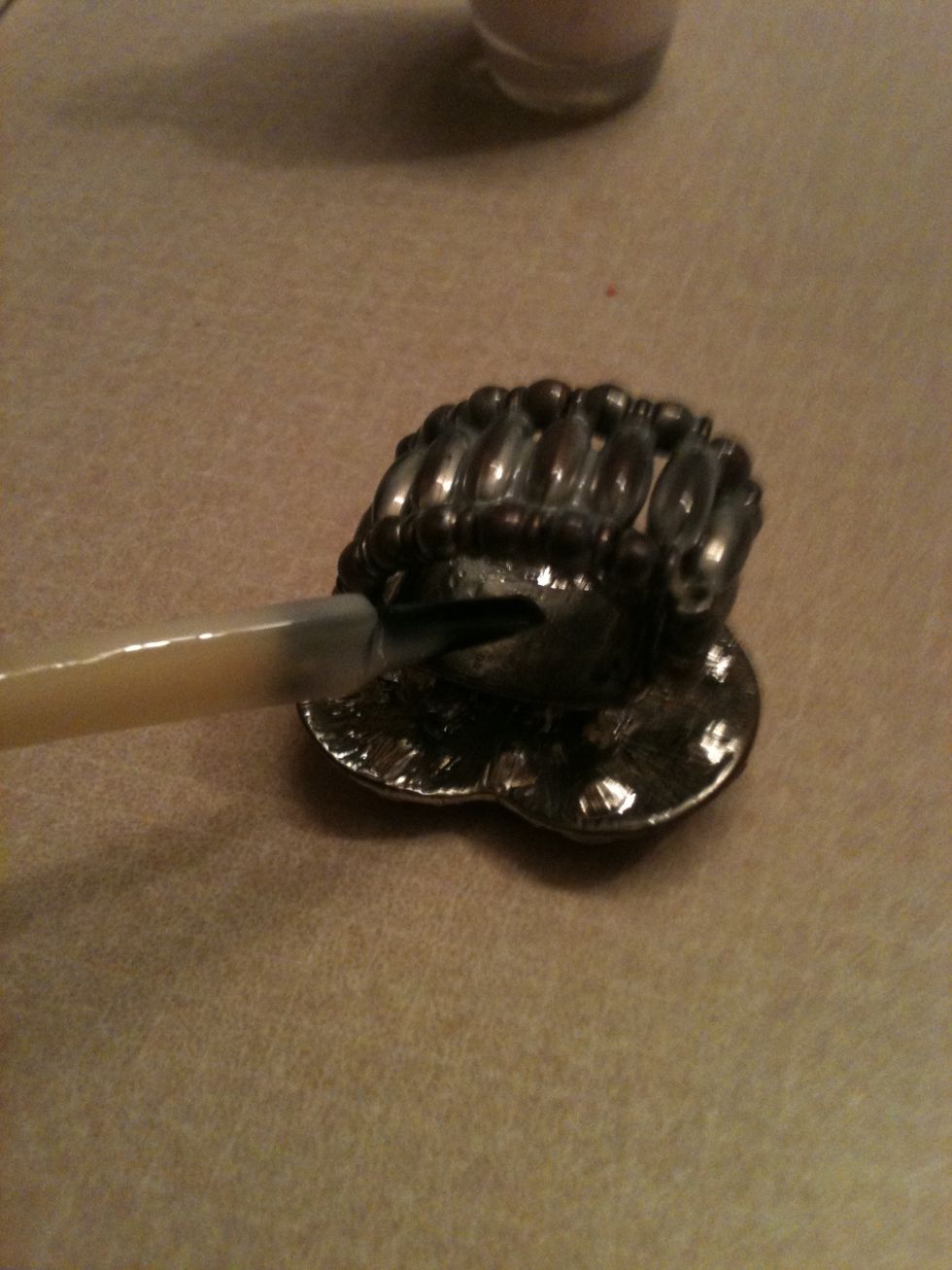 Paint the clear polish all over the band, the inside, and everywhere! At least 2 coats!