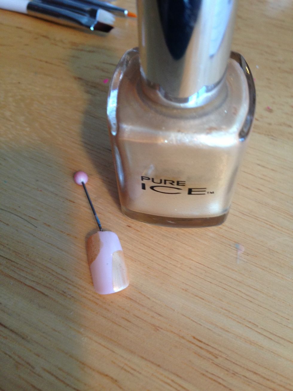Paint the corners with a gold or tan (or any similar color). I used Pure Ice Jaguar. Doesn't have to be perfect but I lay this on thick to let the other colors "melt" into it.