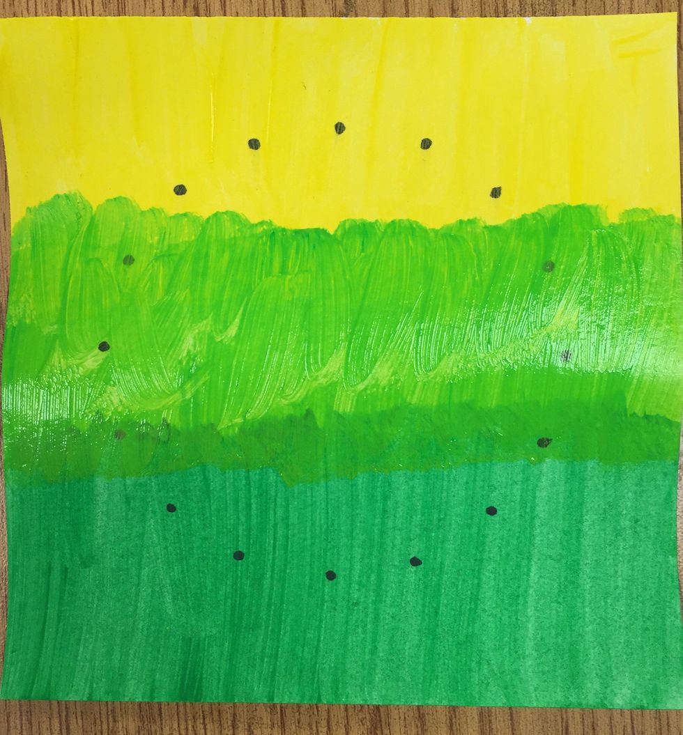 Paint the gap between your first two colors with your Intermediate color.  You may want to paint over the edge of the other two colors a bit so that you have 3 even sections of color.