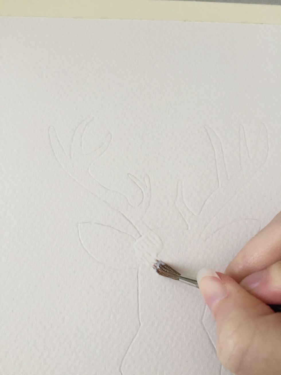 Paint the inside of the deer with the liquid frisket.