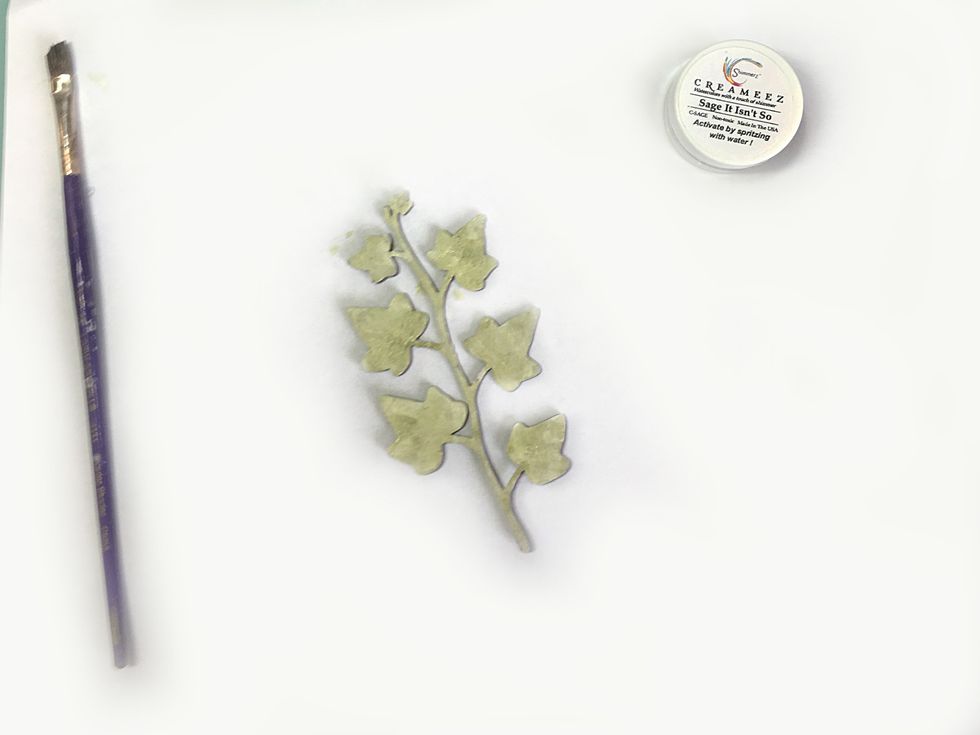 Paint the ivy sprig first with white gesso and then with Shimmerz.