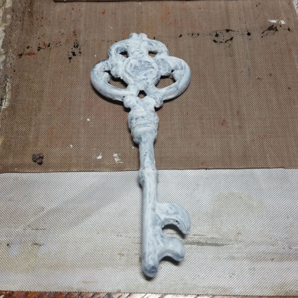 Paint the key with gesso, 2 coats.