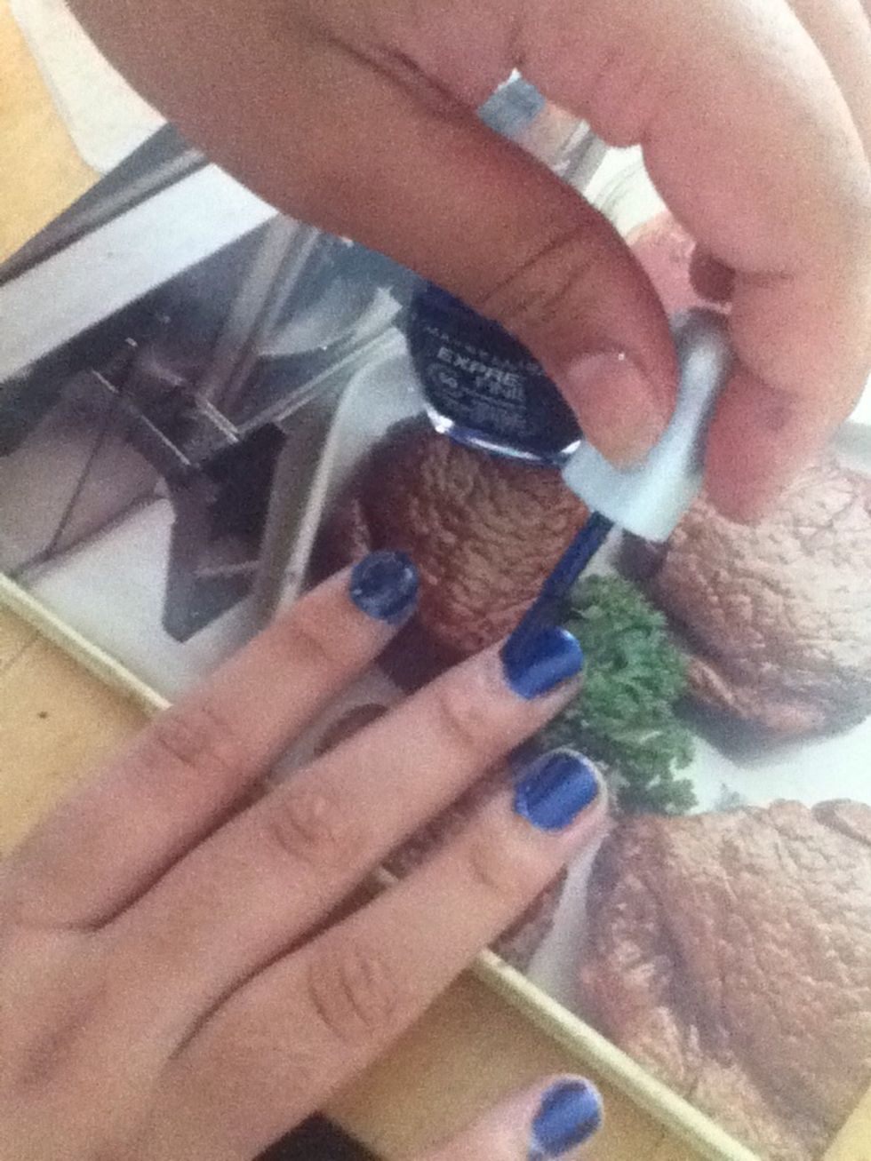 Paint the metallic blue and wait til dry