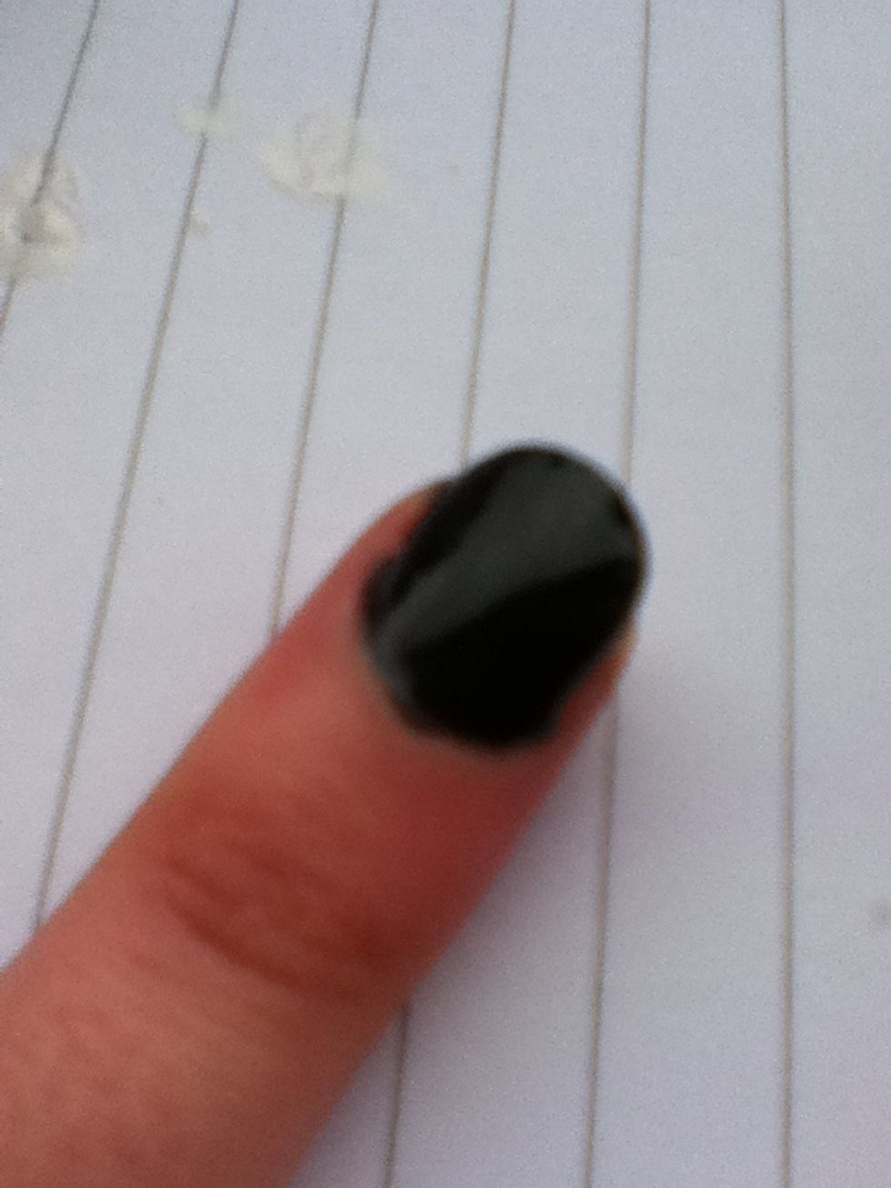 Paint the nail black and let it dry.