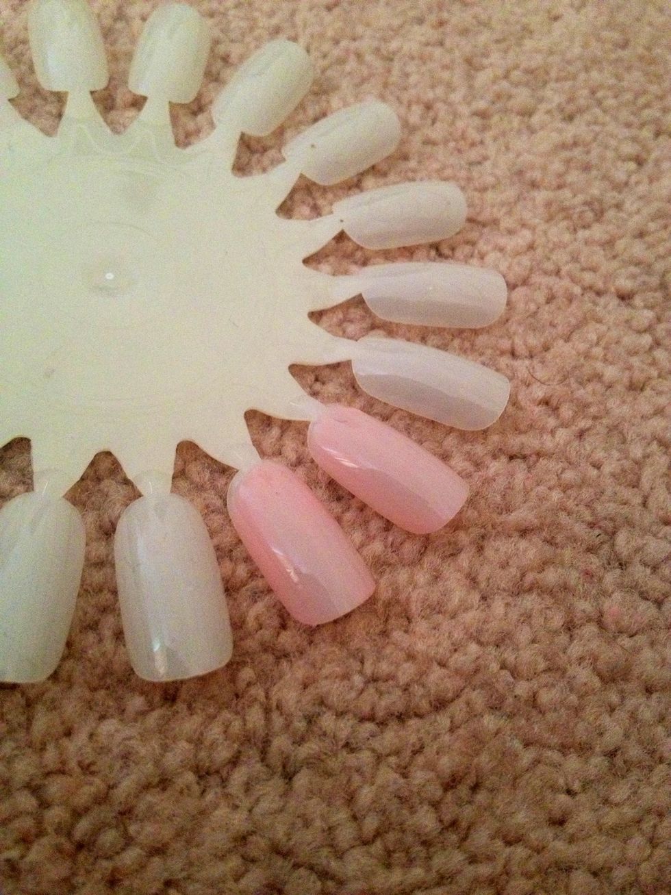Paint the nails with a coat of nail polish. Let it dry completely !