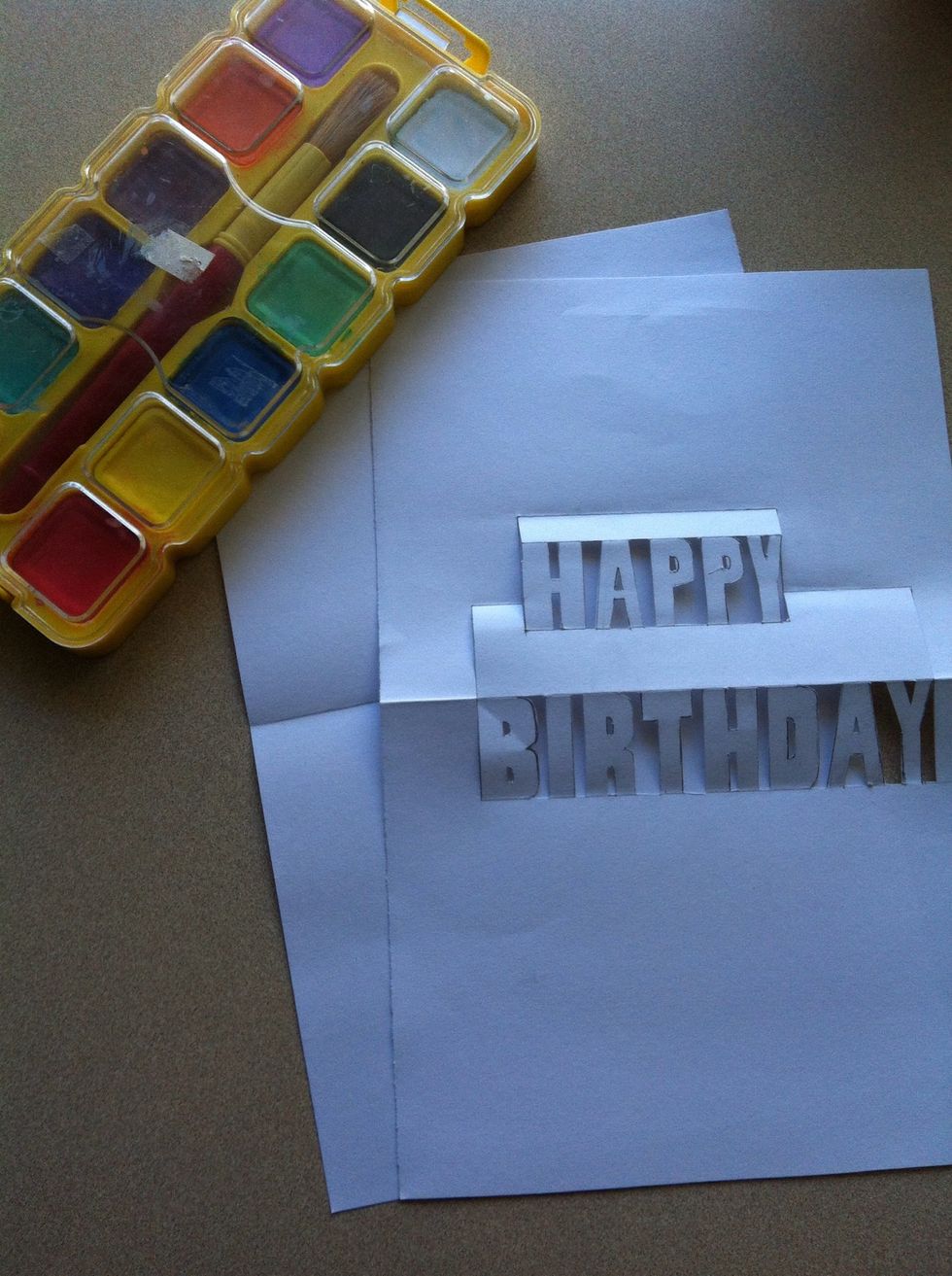 Paint the other piece of paper that you're gonna stick under it to hide the back