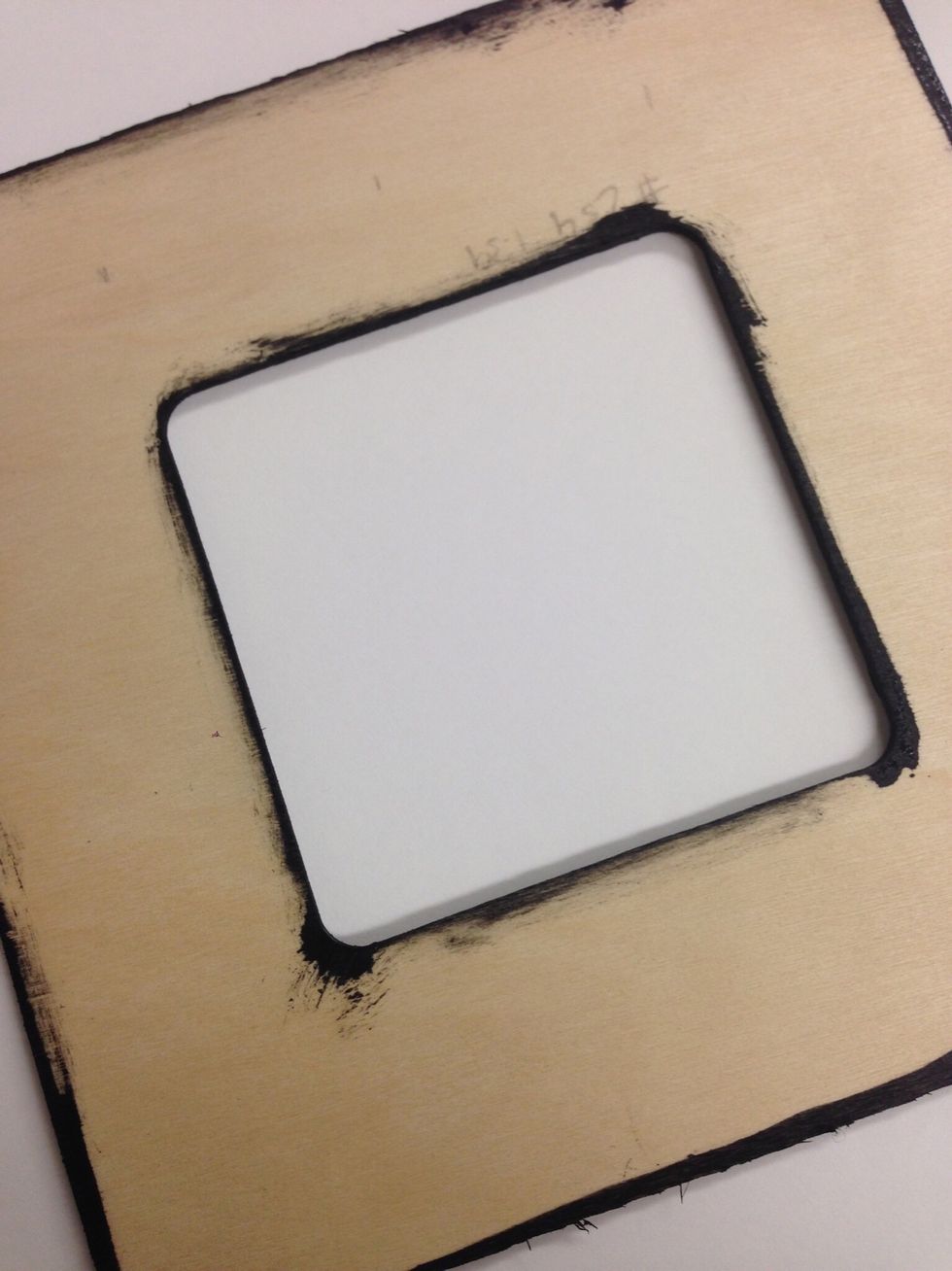 Paint the outside and inside edges of the wooden frame. Leave the rest of the frame on painted.