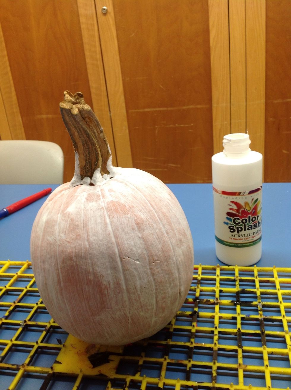 Paint the pumpkin white with ONLY acrylic paint.