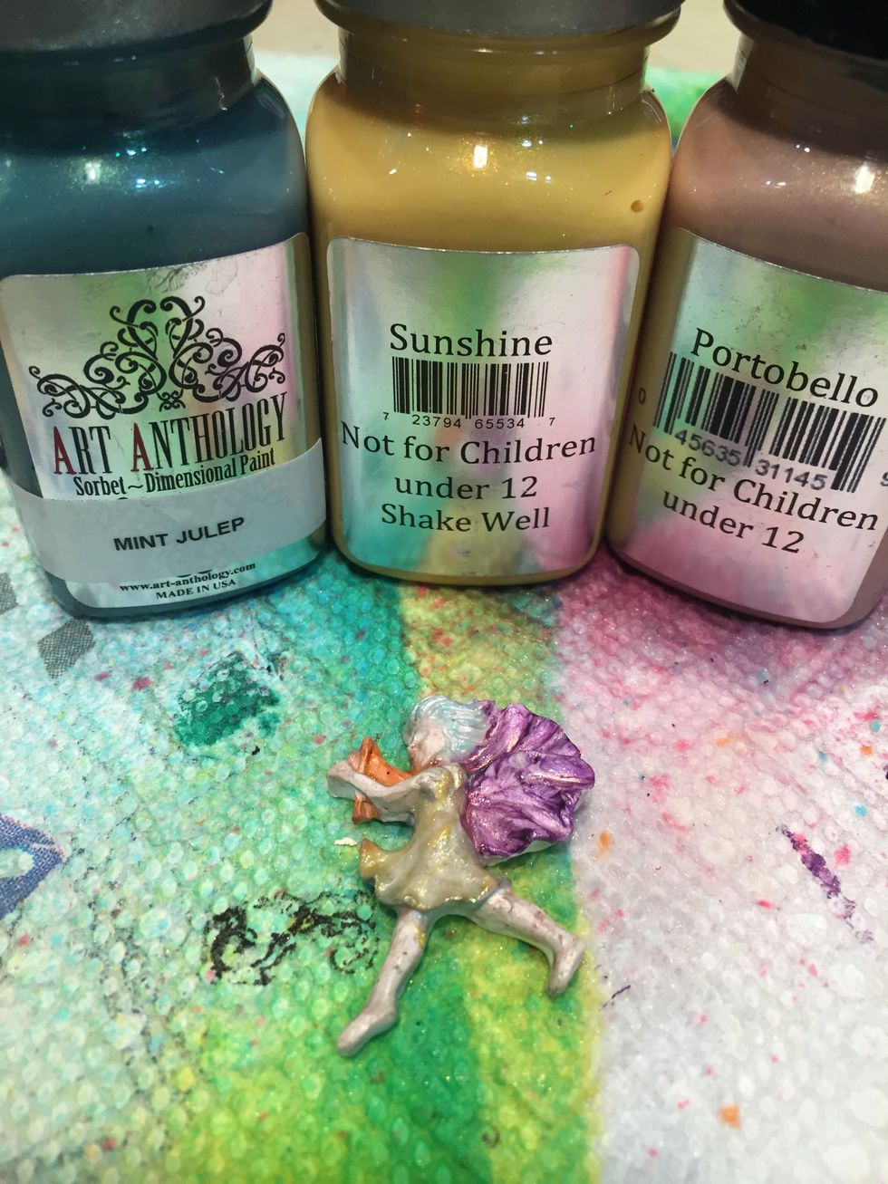 Paint the second fairy with Mint Julep and Sunshine Sorbet, Flourite Dimensional Gems, and Portobello Velvet.  Mist with Gilded Gold Fairy Dust