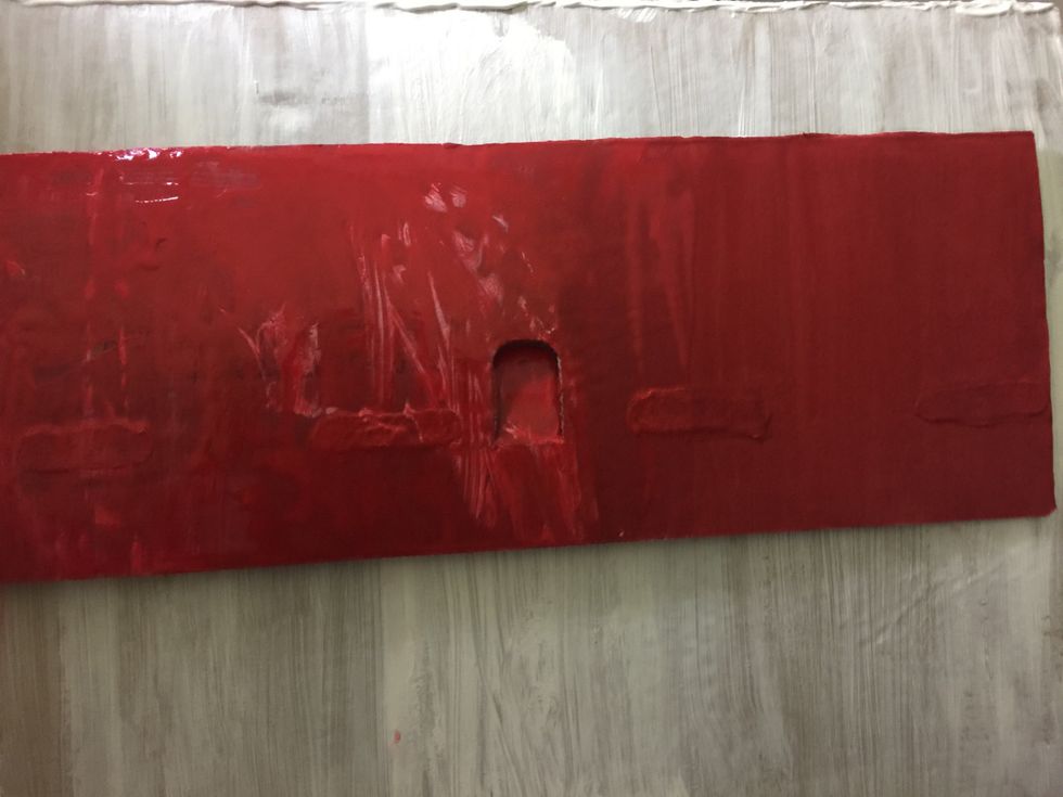 Paint the smallest pieces of cardboard red.