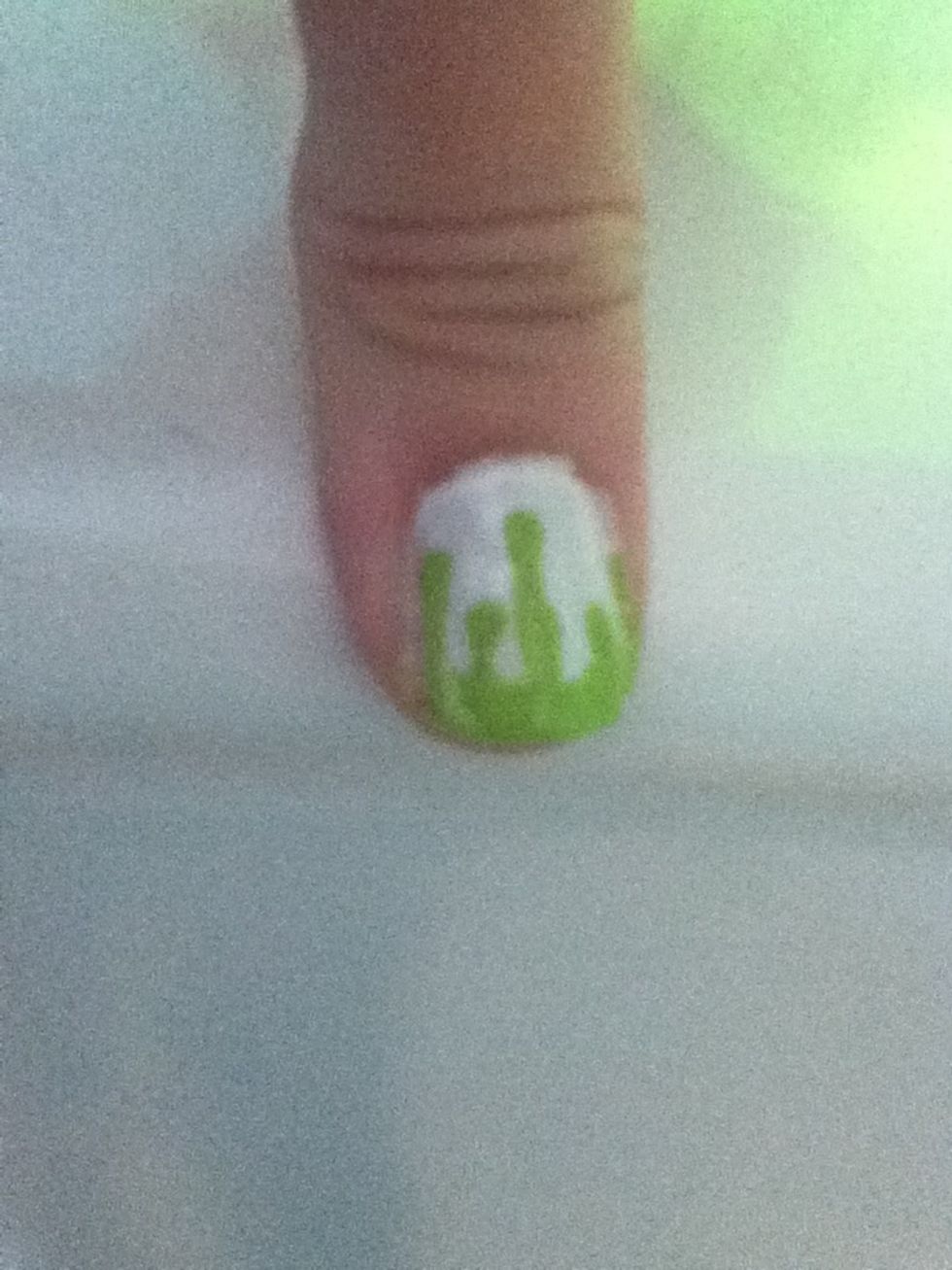 Paint the tip. Also take a bigger dotter and put it at the top of the streaks