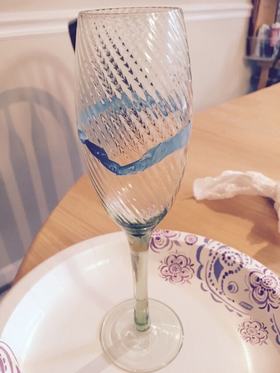 Paint the top of a mermaid fin.