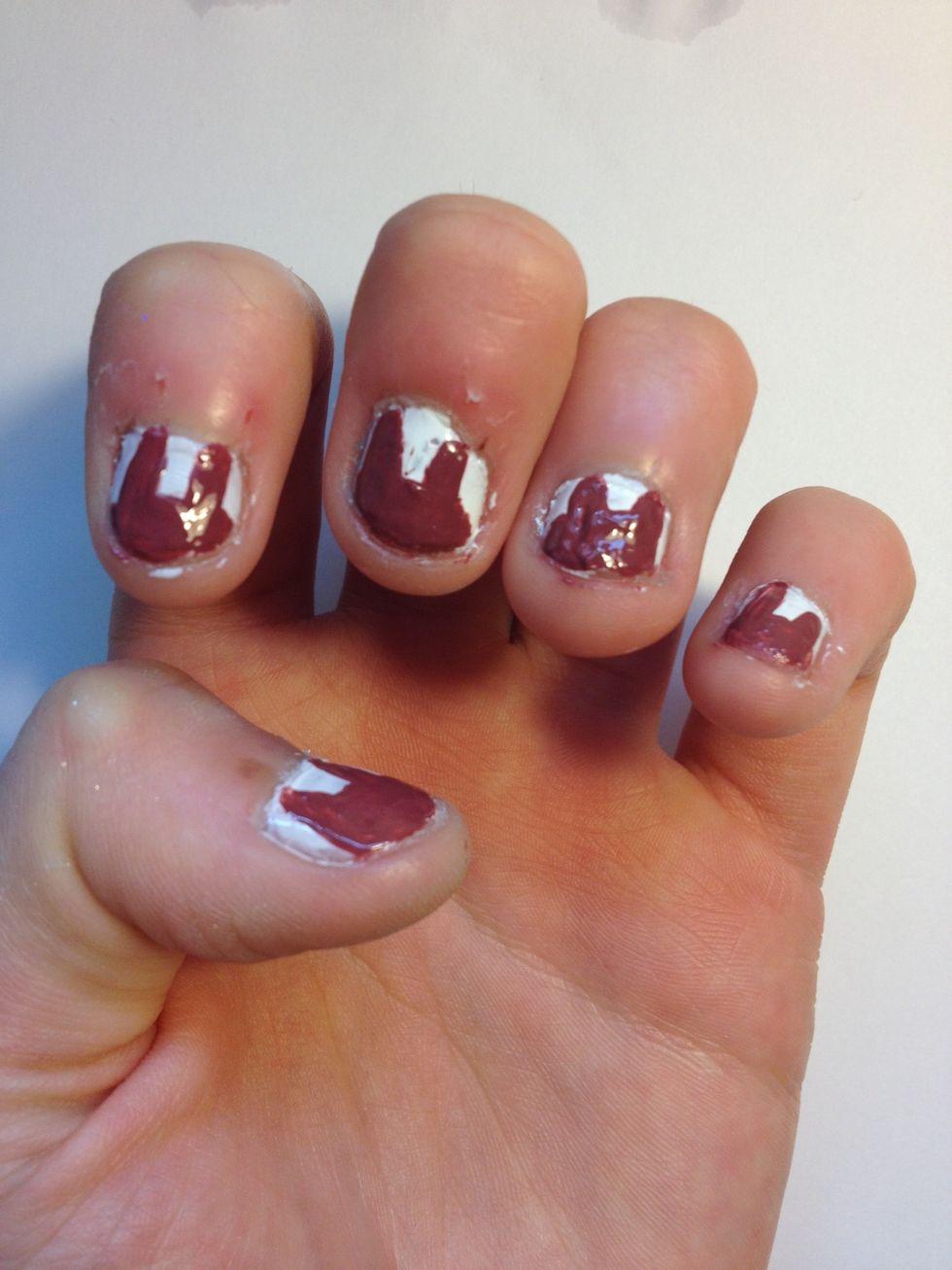 Paint the top part of your bunny's head on each nail. Let this harden like the white polish.