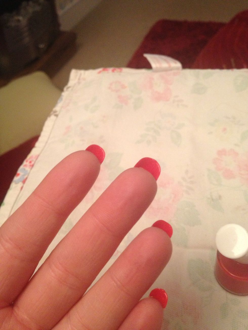 Paint the underside of the nail with the red 2 coats