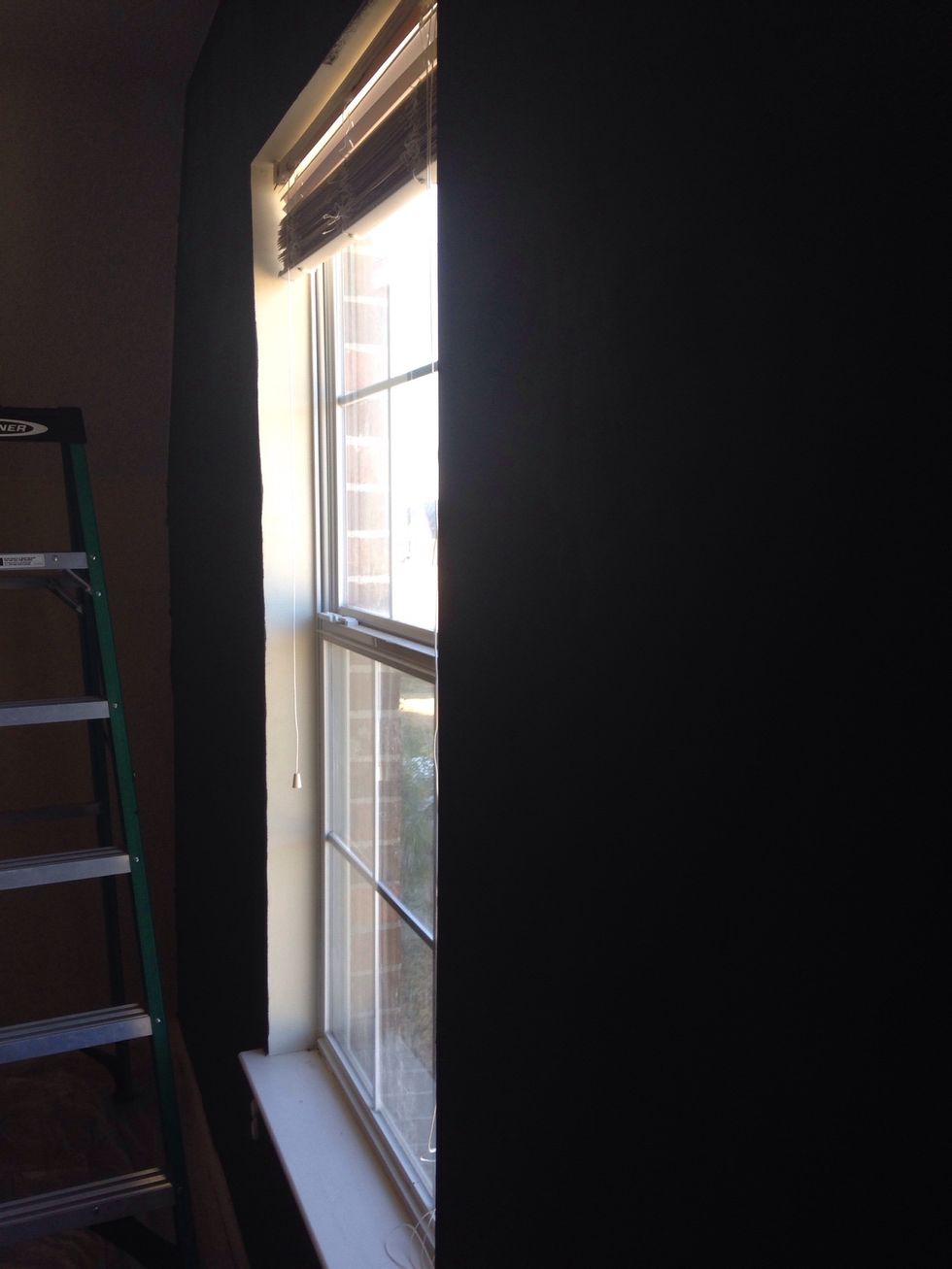 Paint the wall that will have the galaxy black