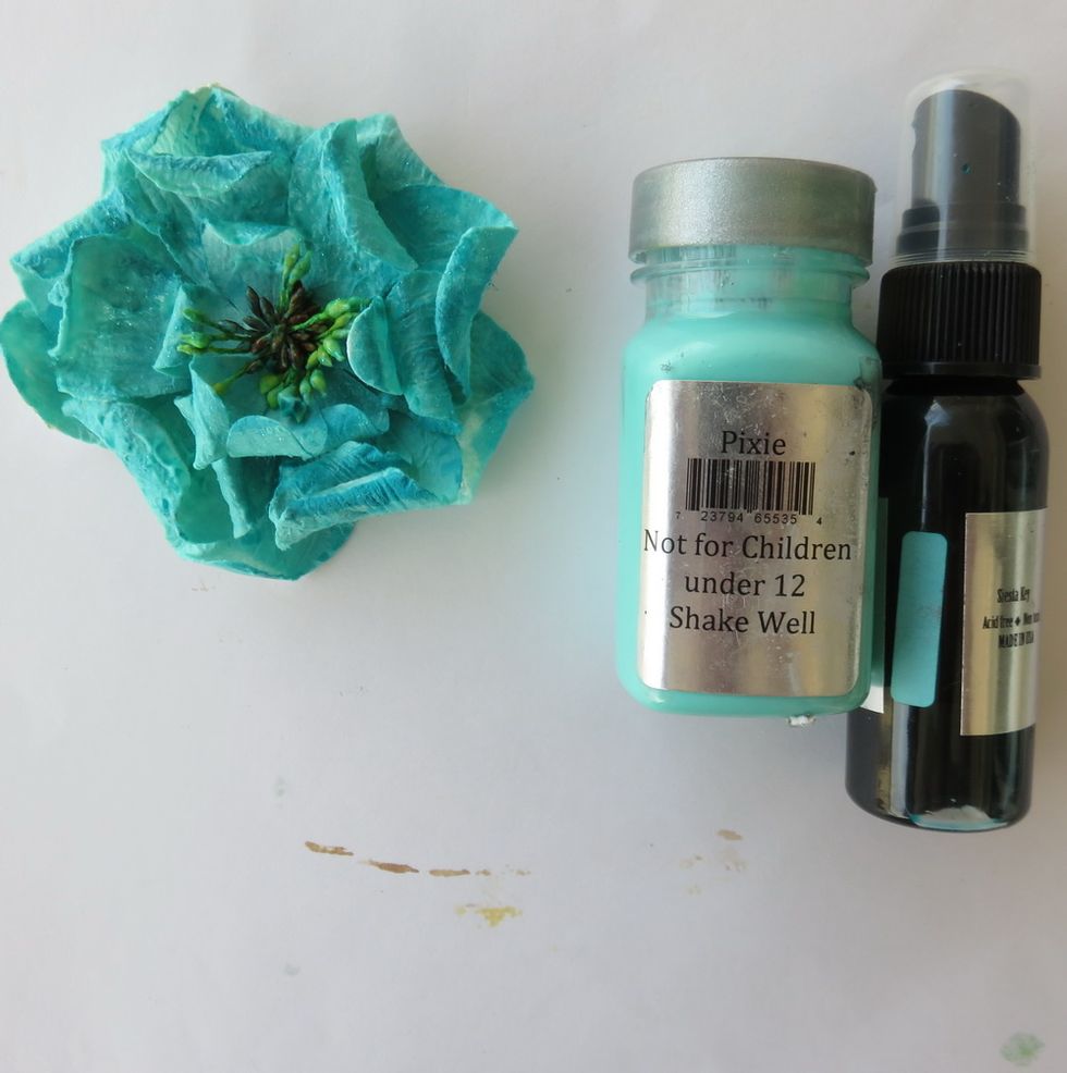 Paint the white paper flower with Pixie Sorbet and when dry add a splash of Peacock Colorations spray.