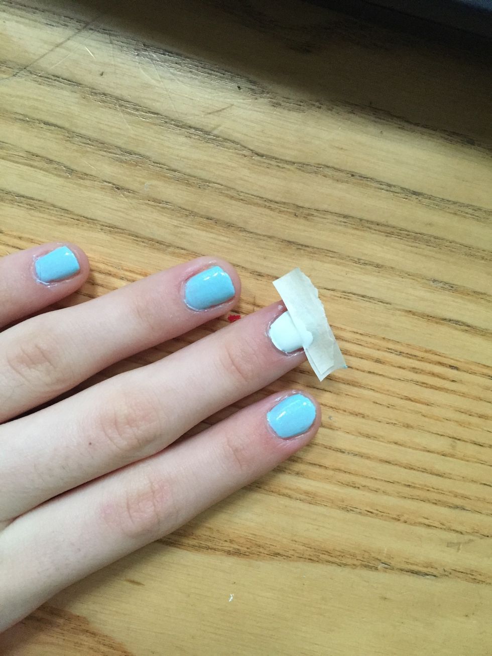Paint the white polish onto the tape\ud83c\udf05