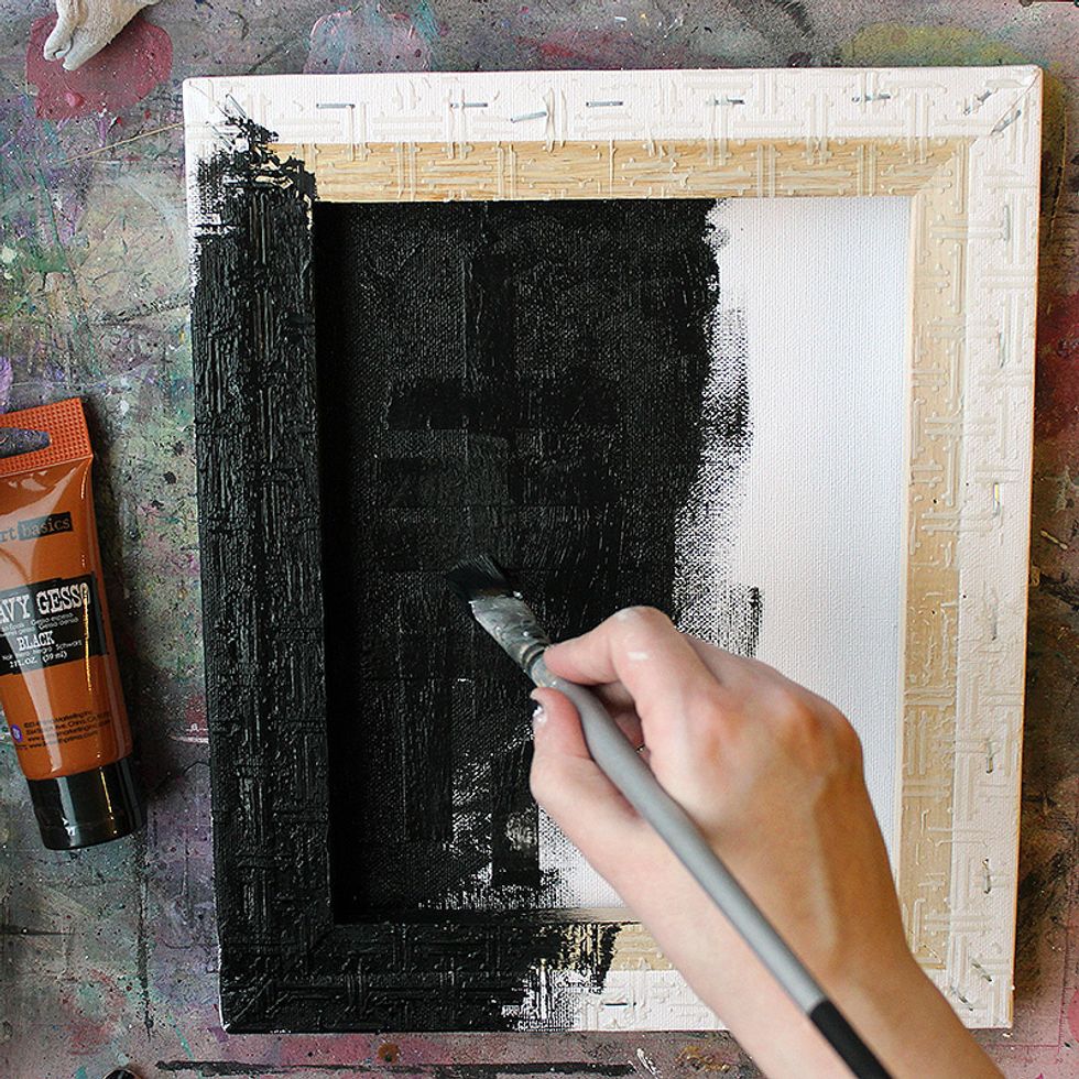 Paint the whole canvas black using Finnabair's Black Gesso.