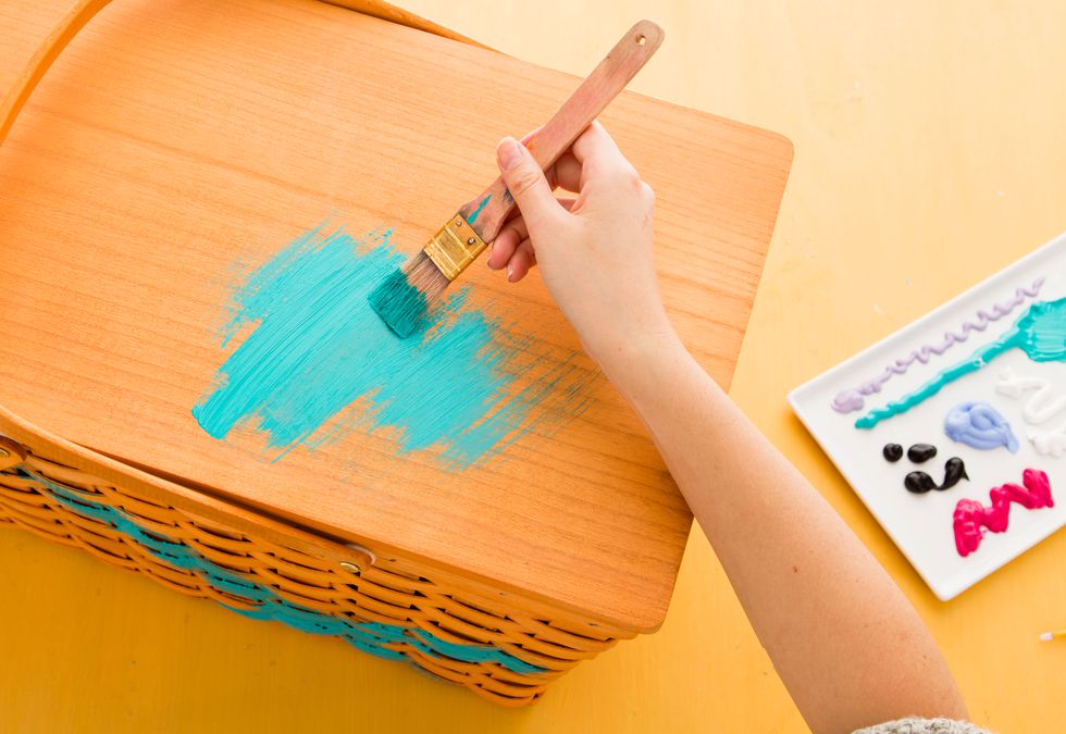 Paint the wicker part of the basket in a solid color.